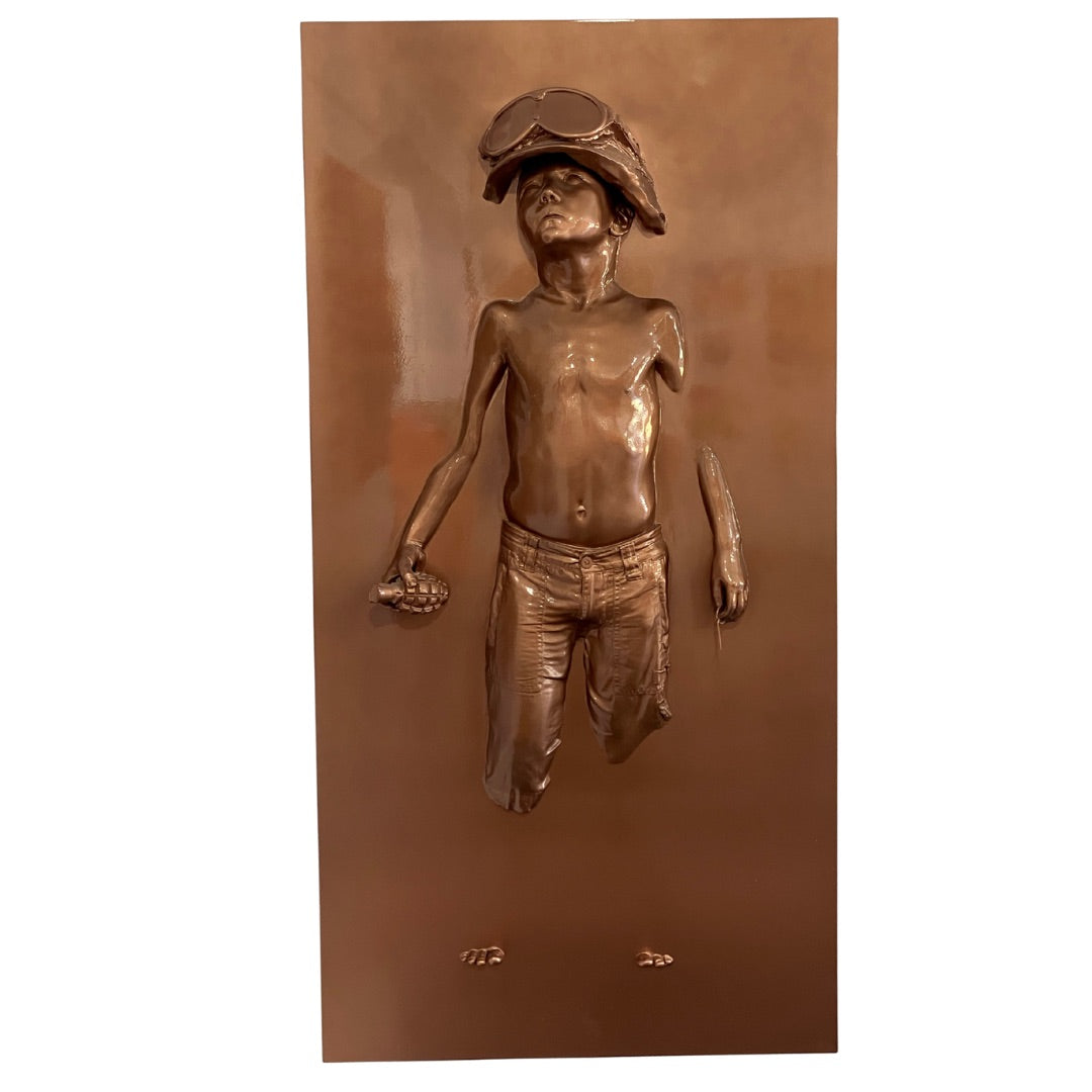 Bronze sculpture of a child wearing goggles on a bronze background
war
sculpture
portrait
Panel Boy Soldier | Prototype
original
contemporary art
Schoony
Framed Artwork