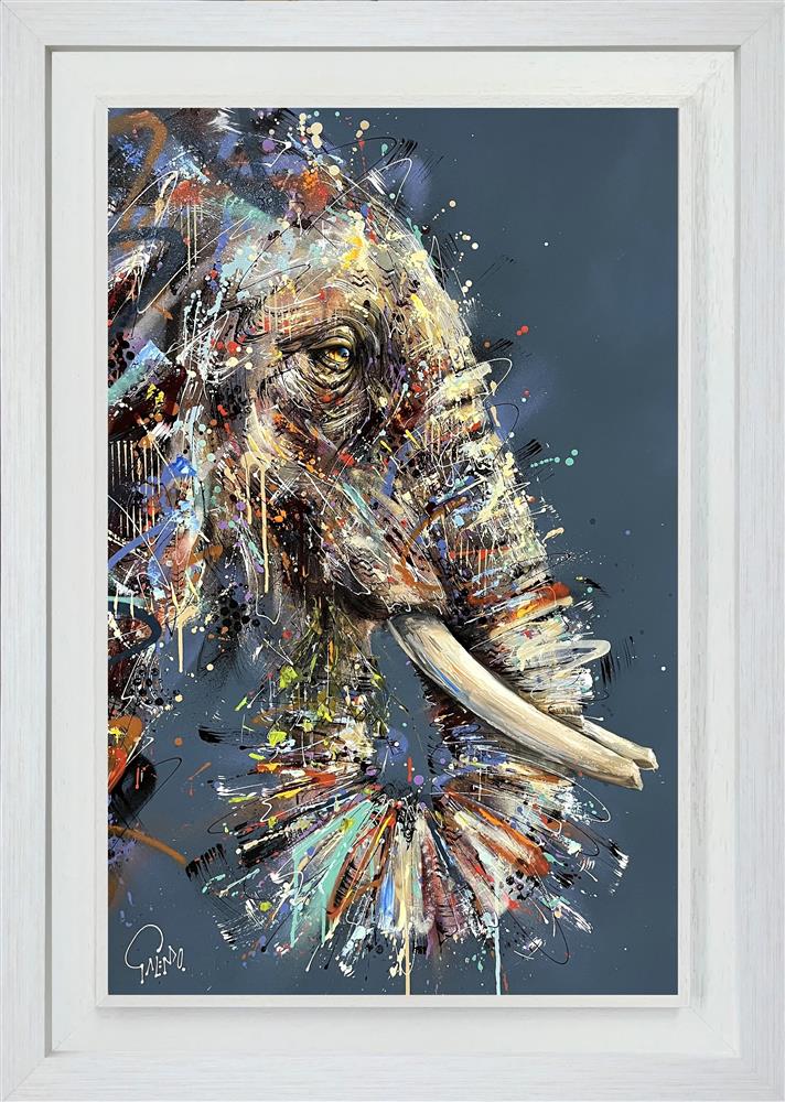 'Willow' by Joe Galindo, a hand-embellished signed limited edition depicting a majestic elephant with vibrant blue and earth-toned textures, in a premium white contemporary frame for collectors in Windsor, Sunningdale, and Ascot.