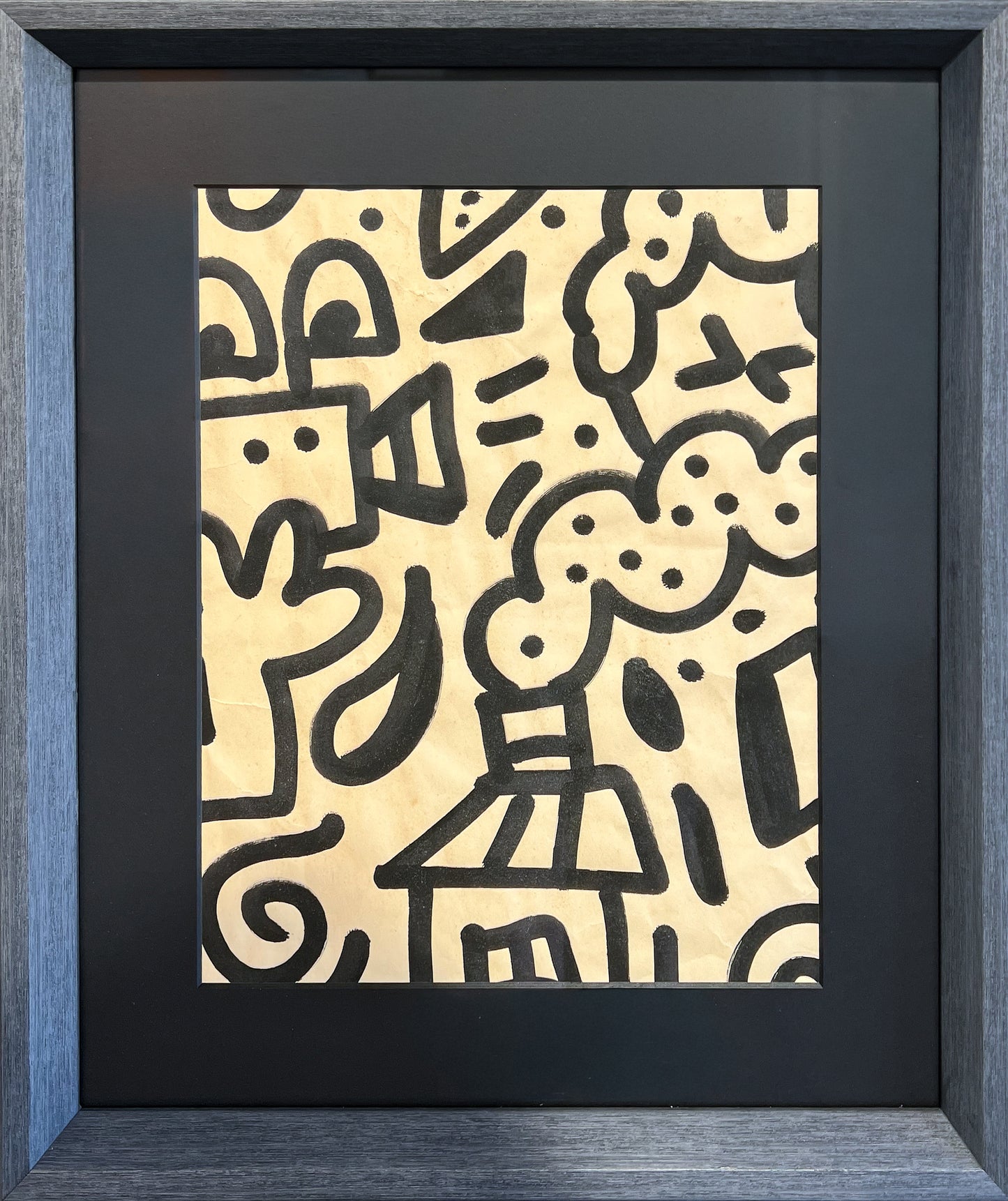 Mr Doodle's Untitled Panel II, a chipboard section covered edge to edge in continuous black ink doodles