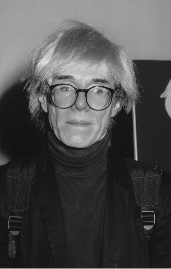 Black and white portrait of Andy Warhol, the pioneer of Pop Art. Creed Gallery offers investment-grade Warhol screenprints for collectors in Ascot, Sunningdale, and Berkshire.