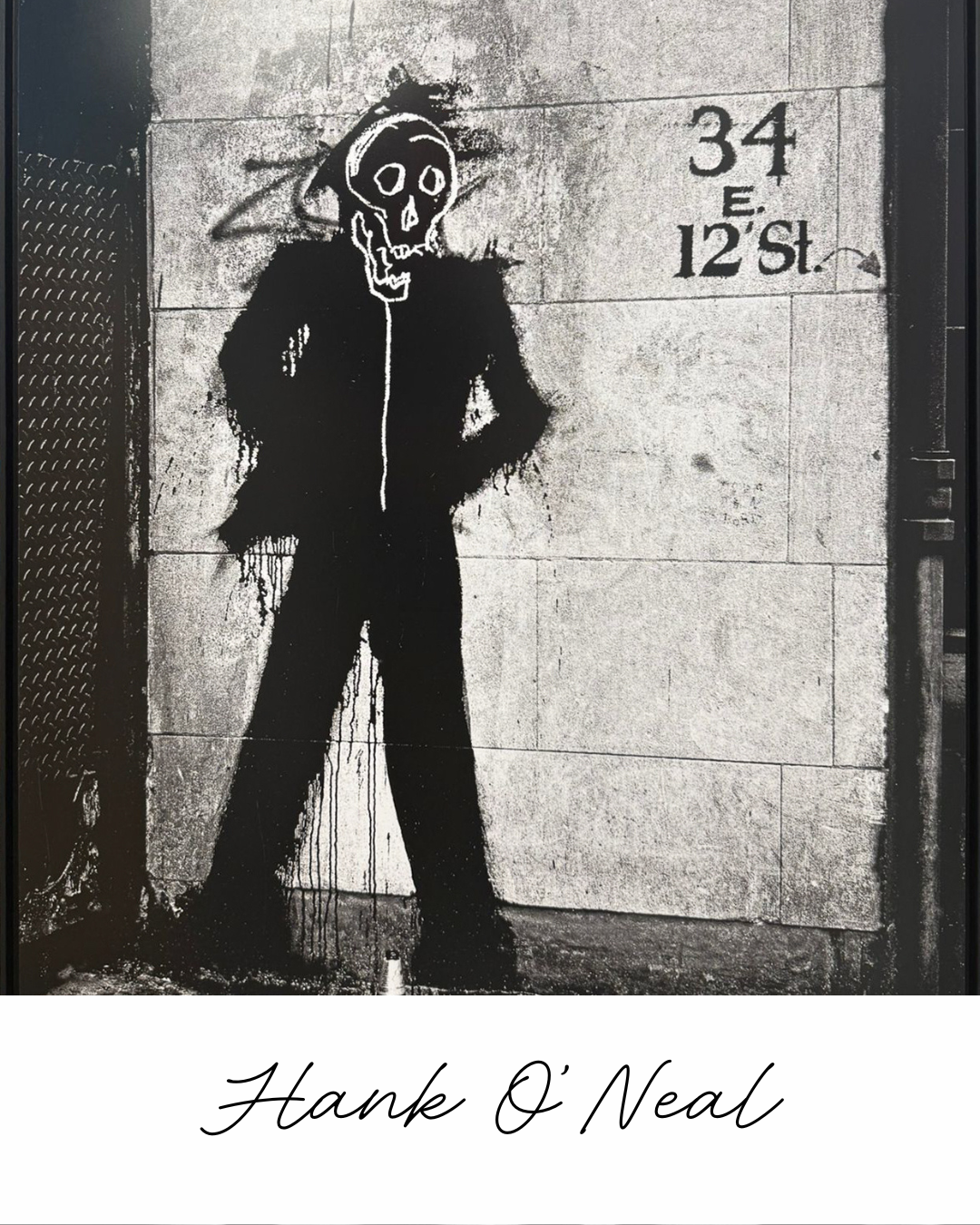 Hank O'Neal's photograph of Richard Hambleton's Shadowman with Basquiat's Skull tag at 34 East 12th Street, New York, 1982