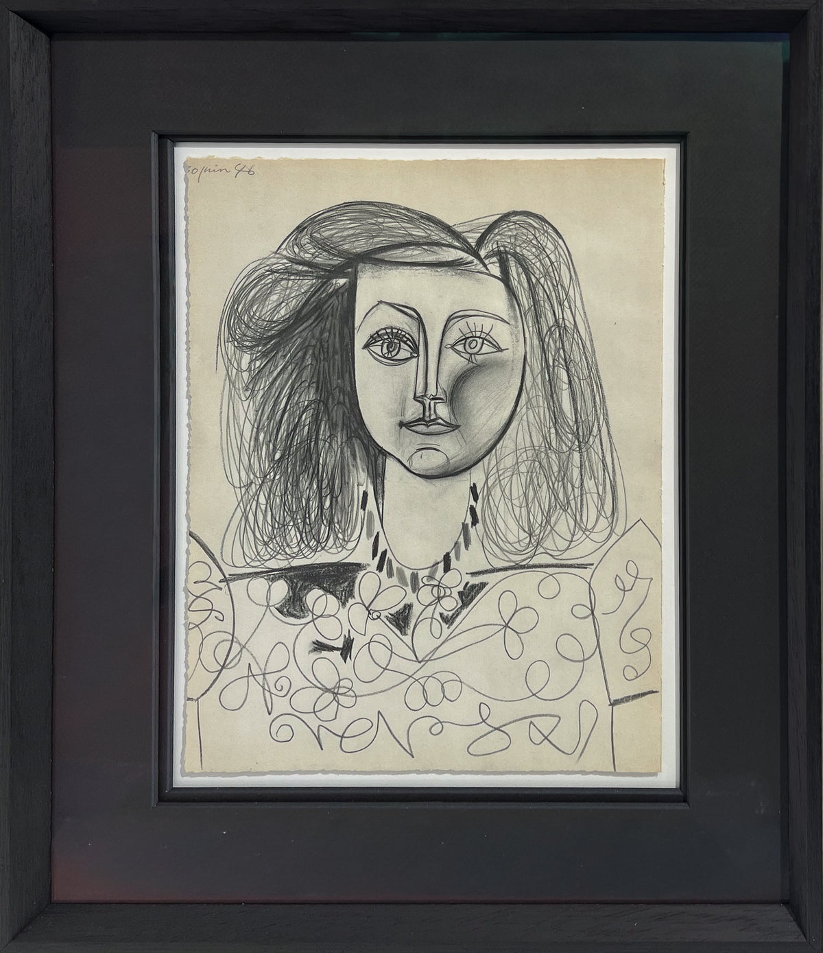 Picasso pencil and crayon drawing of a woman's head and shoulders in a floral-patterned top, dated 1946