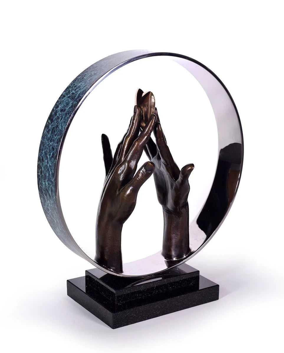 Bronze sculpture of clasped hands within a circular frame
sculpture portrait Michael Talbot Infinite Love fine art figurative edition contemporary art bronze For Sale Surrey 