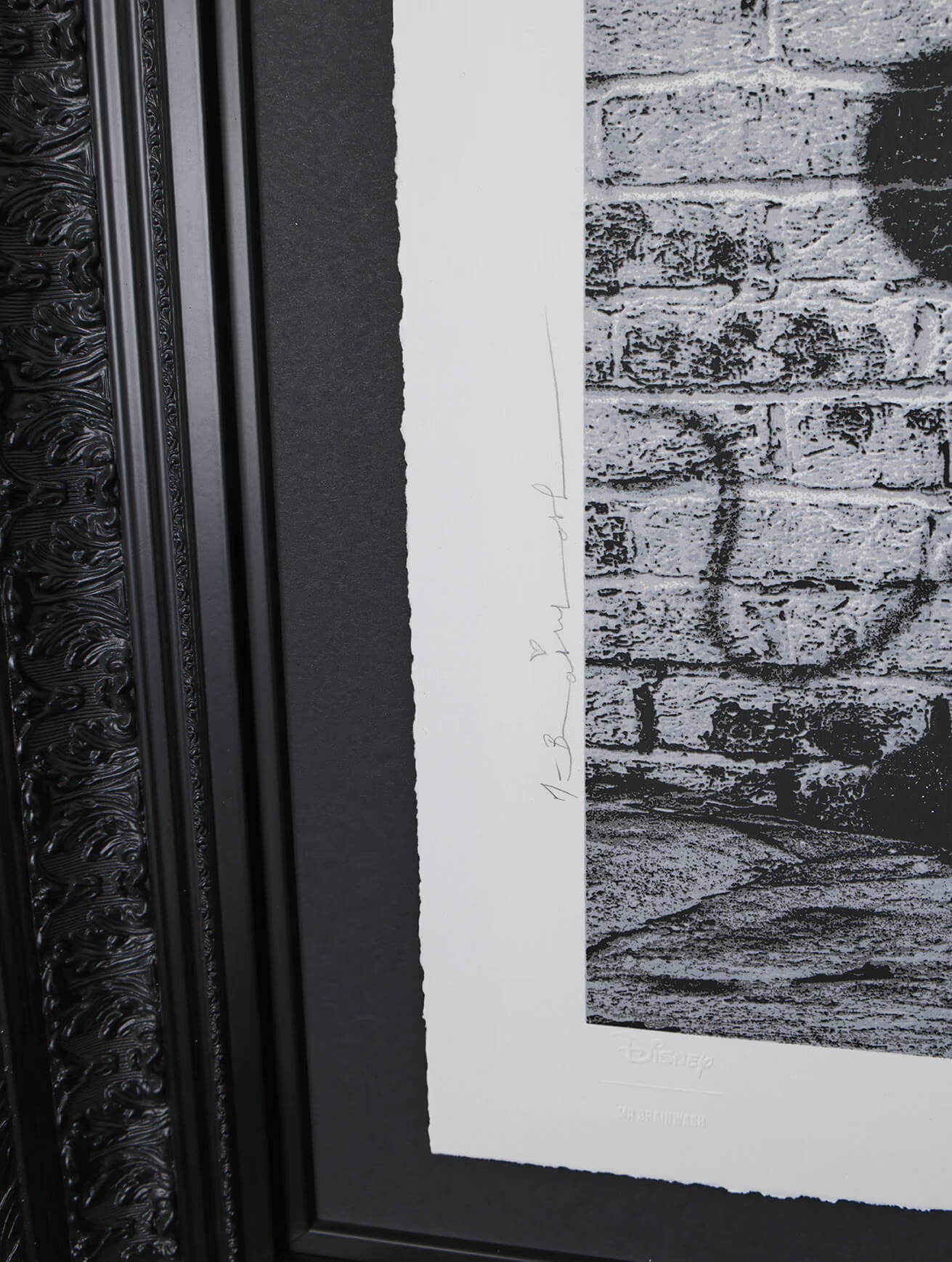 A side-profile view of the black ornate frame for the "Dreams Come True" Deluxe Edition. The image showcases the deep 37.5" x 37.5" (95 x 95 cm) frame profile and the high-end production value of this signed limited edition Disney print.