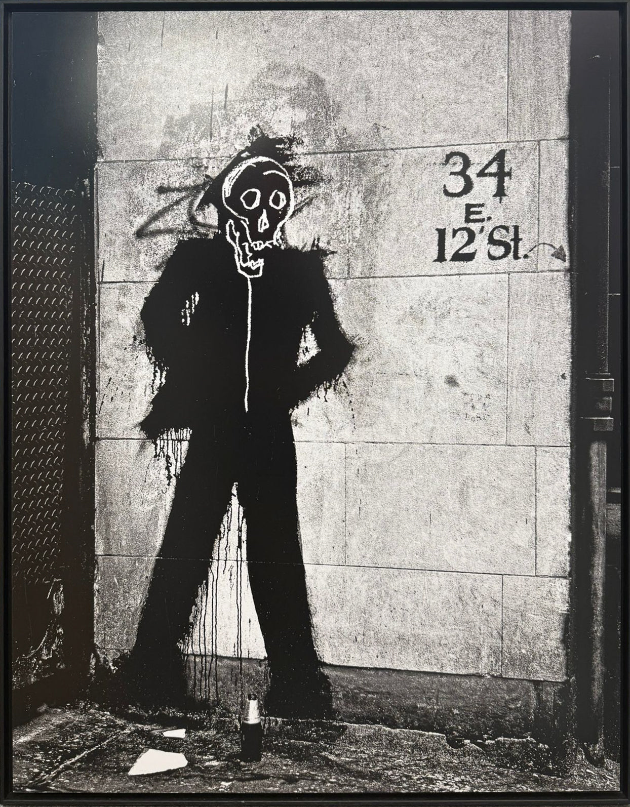 Hank O'Neal's photograph of Richard Hambleton's Shadowman beside Basquiat's Skull tag, 34 East 12th Street, New York, 1982