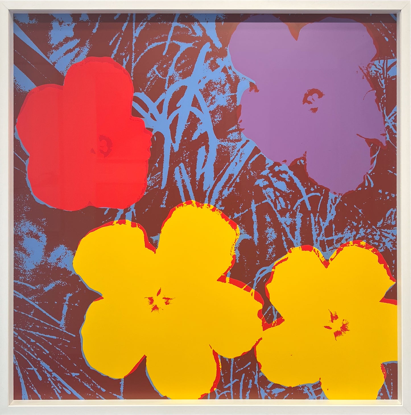 Warhol-style red and purple flower silhouettes over a blue foliage lattice, with two large yellow flowers below