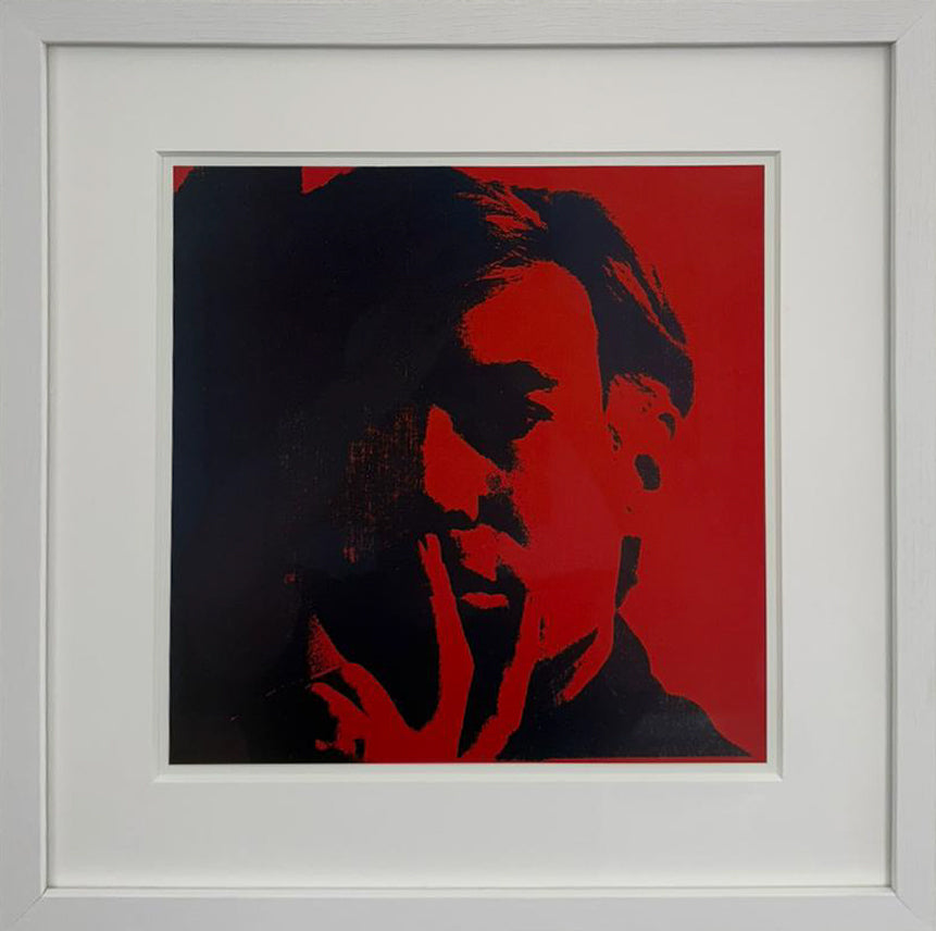 Andy Warhol's 1967 self-portrait, his face and raised hand rendered in red and black