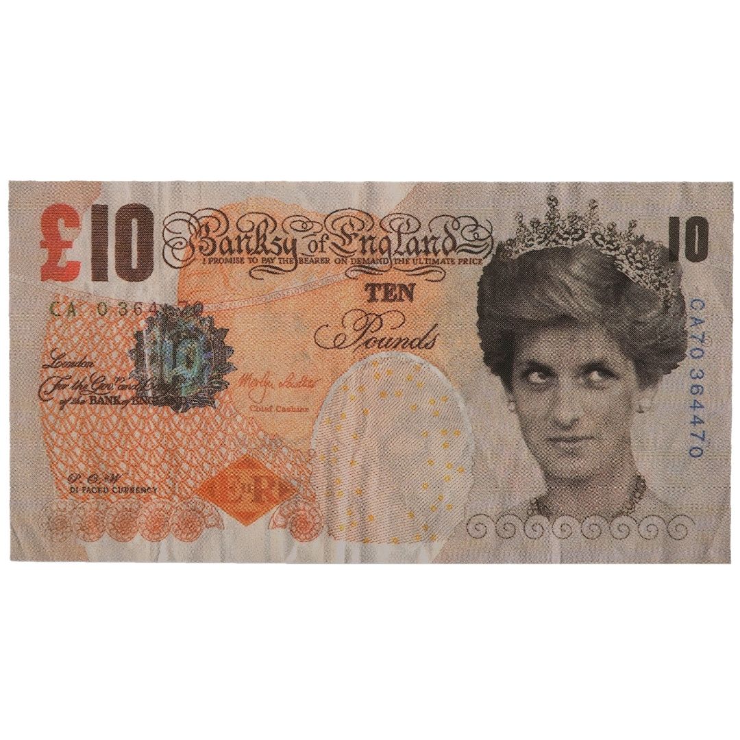 The reverse side of Banksy’s 'Di-Faced Tenner' featuring Charles Darwin and the subversive motto 'Trust No One' in the lower-right corner, professionally framed by Creed Gallery.