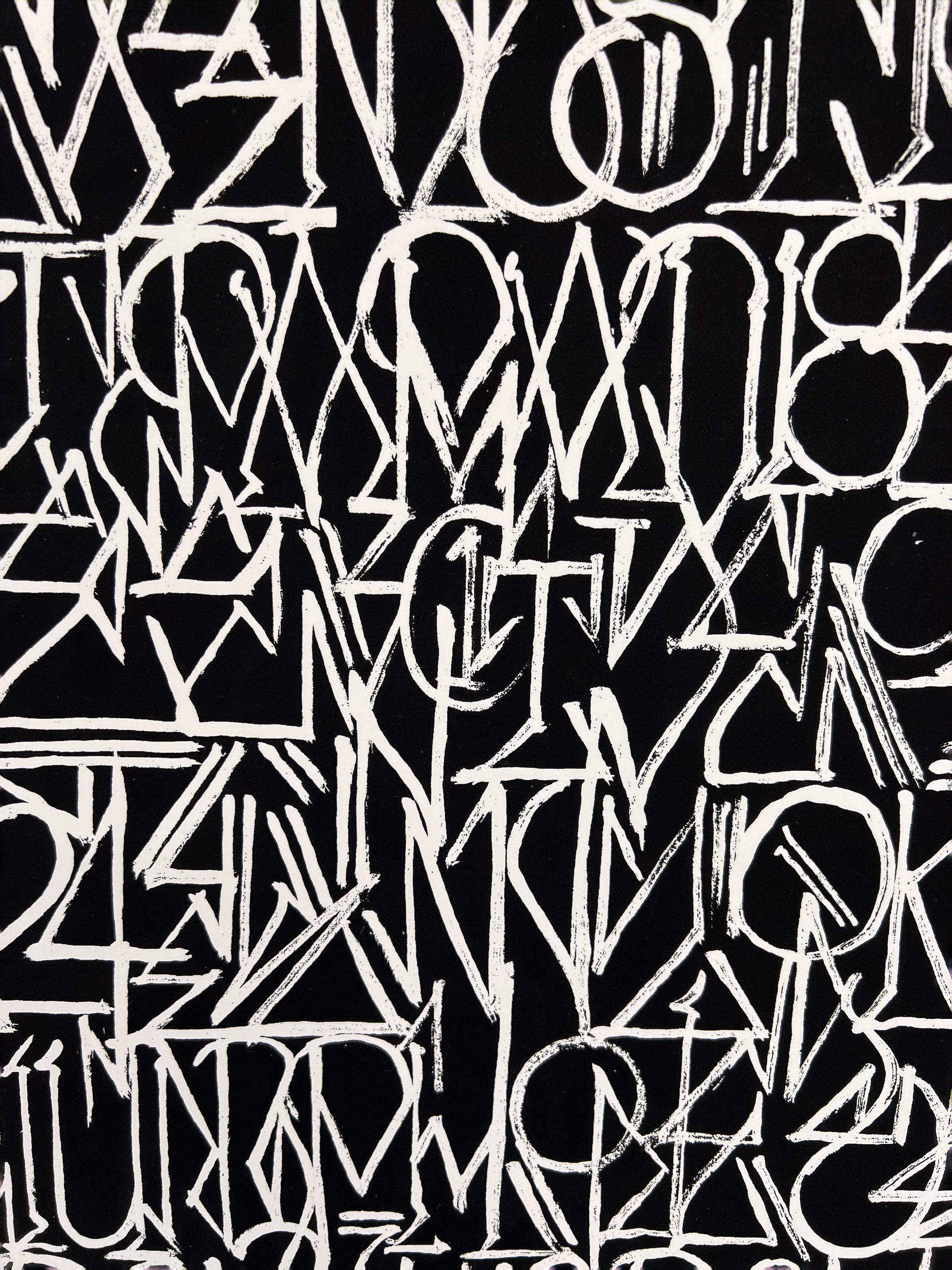 DEFER original "Spiritual Language" painting, white calligraphic scrawl on a black background, framed and available now at Creed Gallery, serving Ascot and Virginia Water.