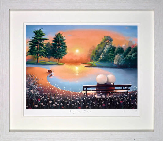 Doug Hyde - 'Together Time' - Framed Limited Edition Giclée Print. A romantic lakeside scene featuring two iconic Doug Hyde characters and their dog sitting on a bench at sunset, displayed at Creed Gallery Ascot.