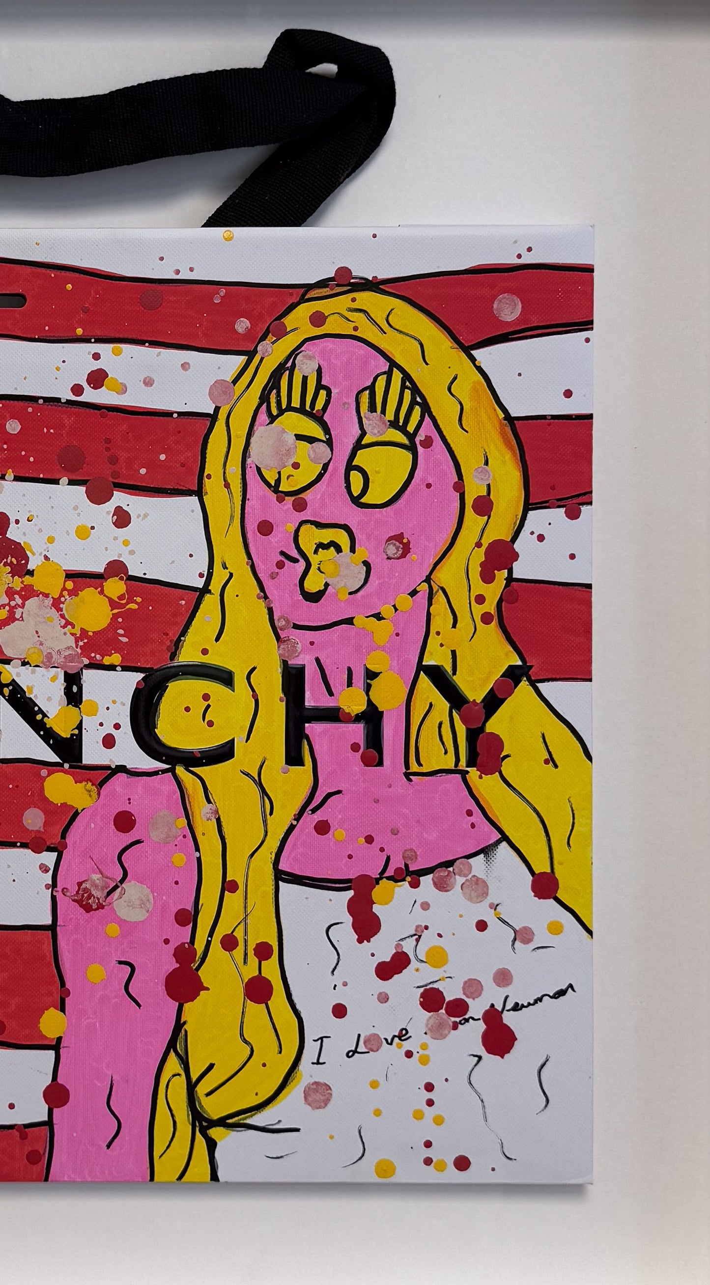 Close-up detail of the "Givenchy" original work, showing two hand-painted characters against a vibrant American flag-style background. The image highlights the raw, "New Pop" street-art textures and pink paint splatters applied by Forbes 30 Under 30 artist Mason Newman.