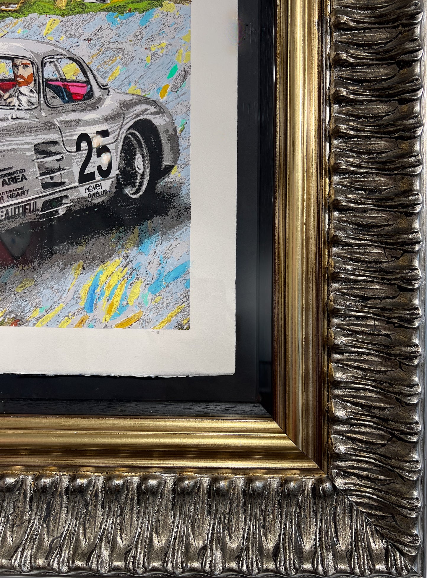 Detail of Mr. Brainwash 'Life is Beautiful' limited edition 4 of 16 — pencil edition number visible on archival paper, framed in ornate silver and gold moulding at Creed Gallery, Ascot