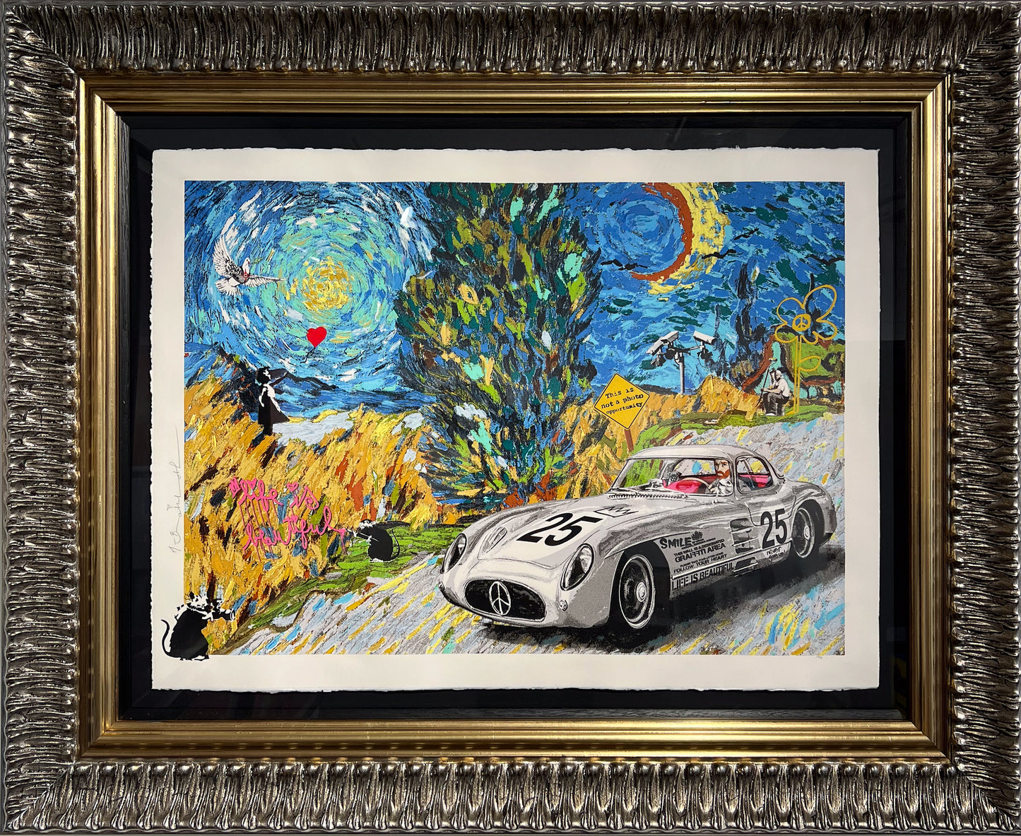 Mr. Brainwash 'Life is Beautiful' — mixed media limited edition print combining Van Gogh's Starry Night with a vintage Mercedes-Benz 300SL race car, Banksy rat, and street art iconography, in an ornate silver and gold frame at Creed Gallery, Ascot, Berkshire