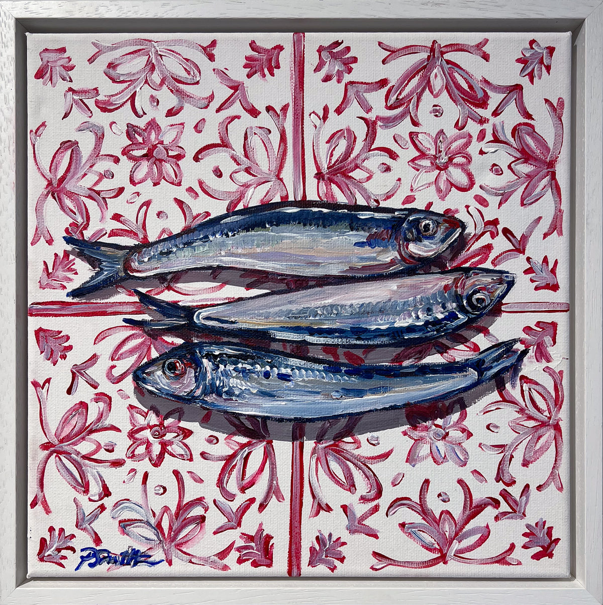 Pippa Smith Sardines on Pink Tiles, three silver-blue sardines on a pink and red floral tile, in a white frame