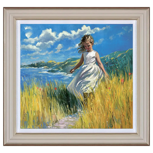 Framed hand-embellished canvas 'A Coastal Stroll' by Sherree Valentine Daines, showing a young girl in a white dress near the coast.