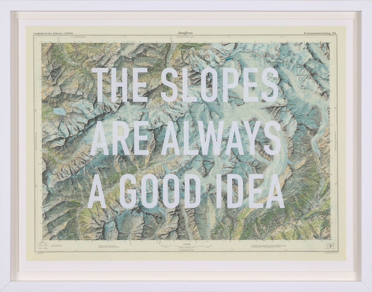 Framed vintage map artwork by The Real Hackney Dave featuring bold blue typography 'The Slopes Are Always A Good Idea,' available at Creed Gallery Ascot