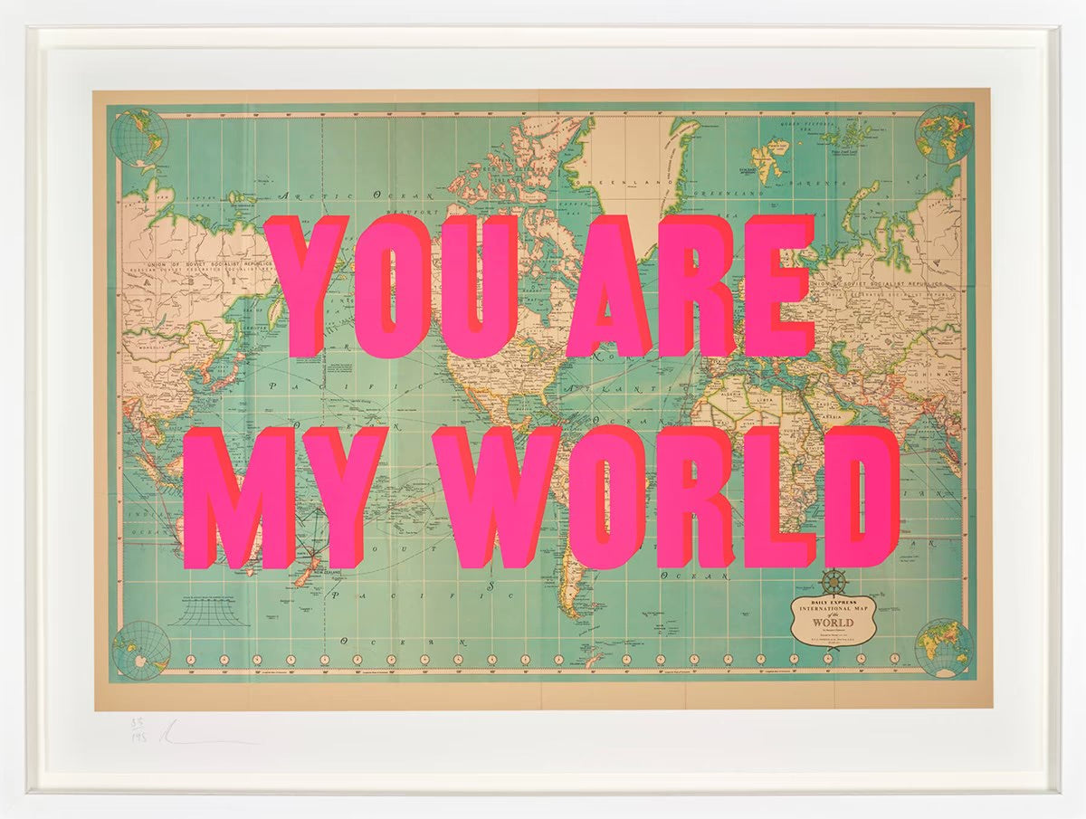 Framed limited edition print 'You Are My World' by artist The Real Hackney Dave, featuring bold bubblegum pink typography overlaid on a vintage map of the world.